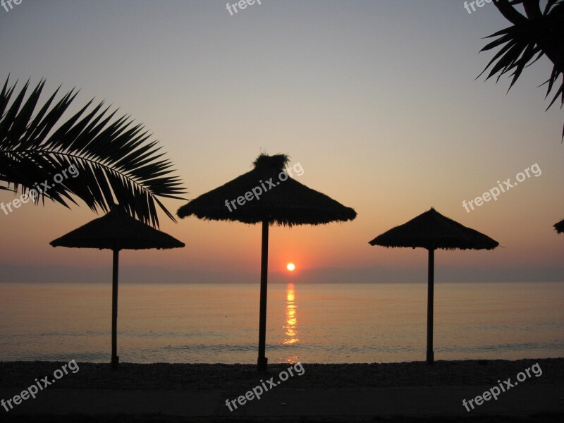 Corfu Vacations Sunset Backlighting Parasols