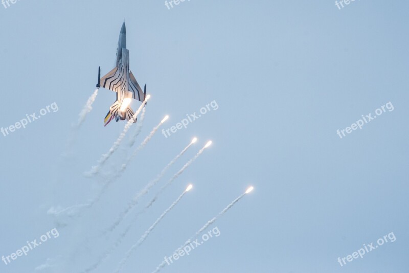 Fighter Aircraft Flares Show Flight Rolling