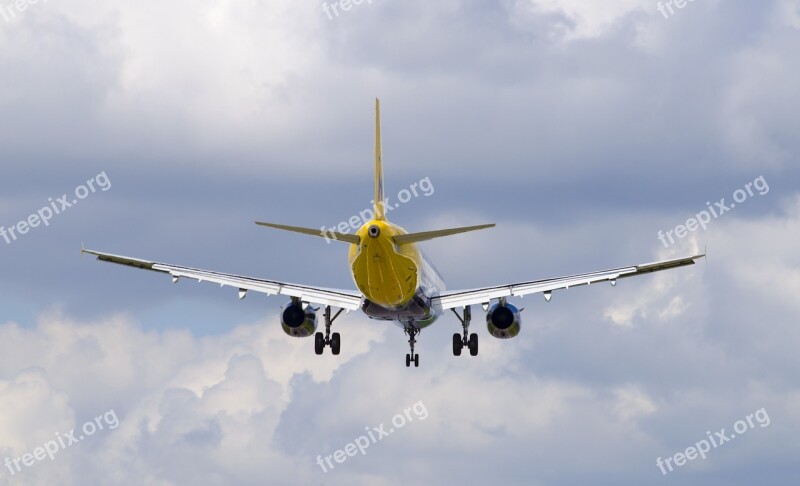 Plane Tail View Landing Clouds