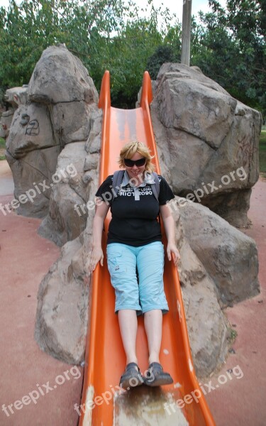 Adult Slide Playing Playground Woman