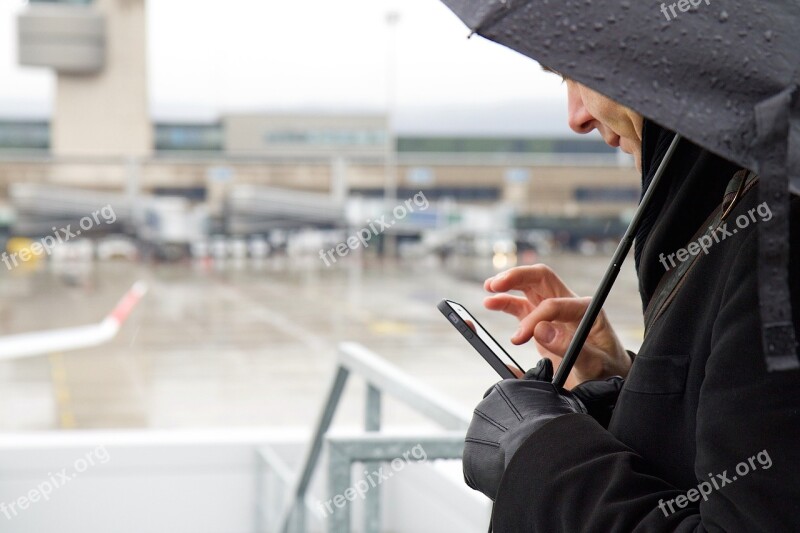 Mobile Communication Glove Airport Rainy Day