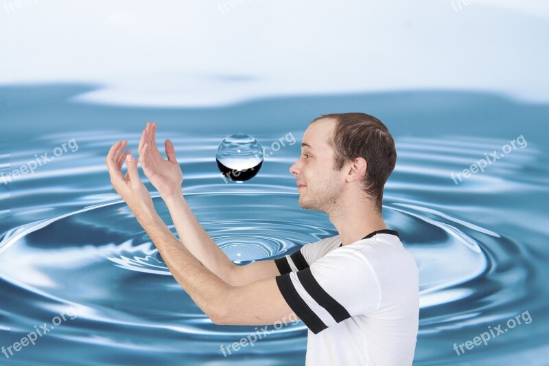 Caucasian Man Gazing Into Water Drop With