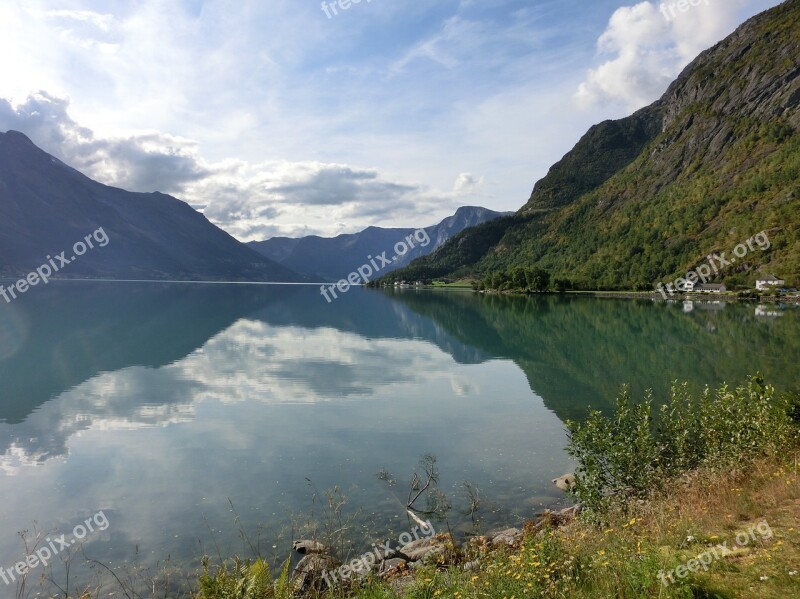 Lake Fjord Mirroring Sky Clouds