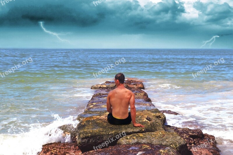 Ocean Man Back Storm Brooding