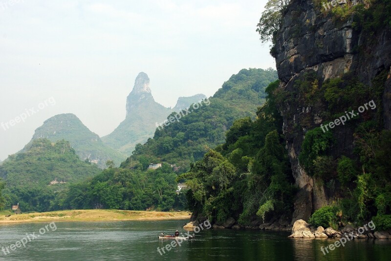 China Yangshuo Li River Boat Fisherman