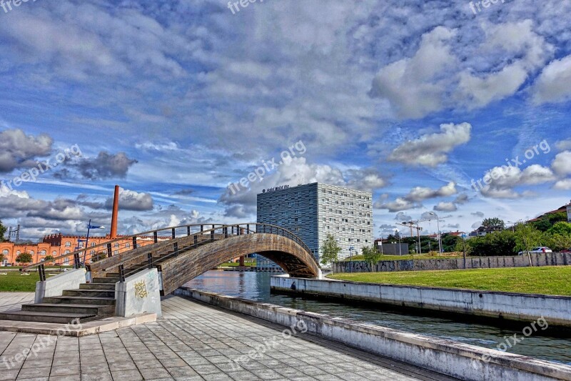 Bridge Crossing Pathway Over Canal