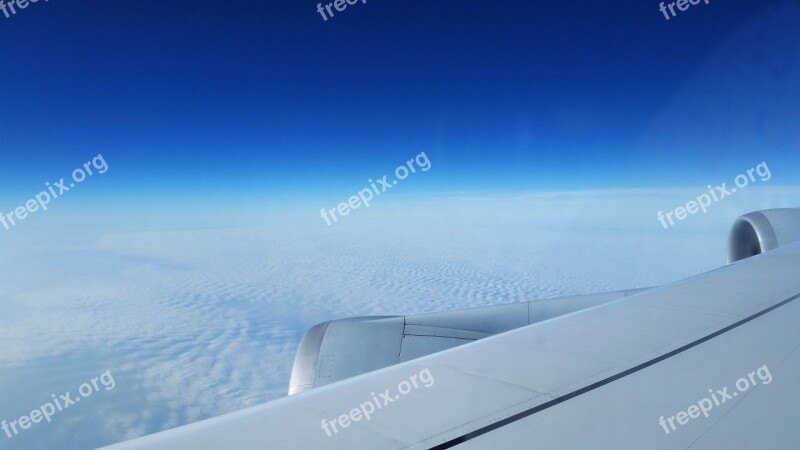 Aircraft Above The Clouds Travel From The Plane Flyer