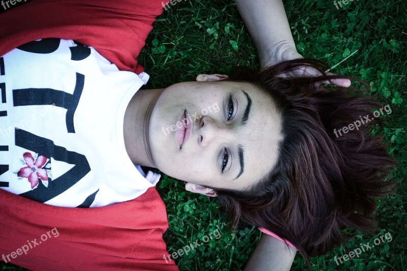 Girl Relax Lifestile Laying On Grass Dreaming