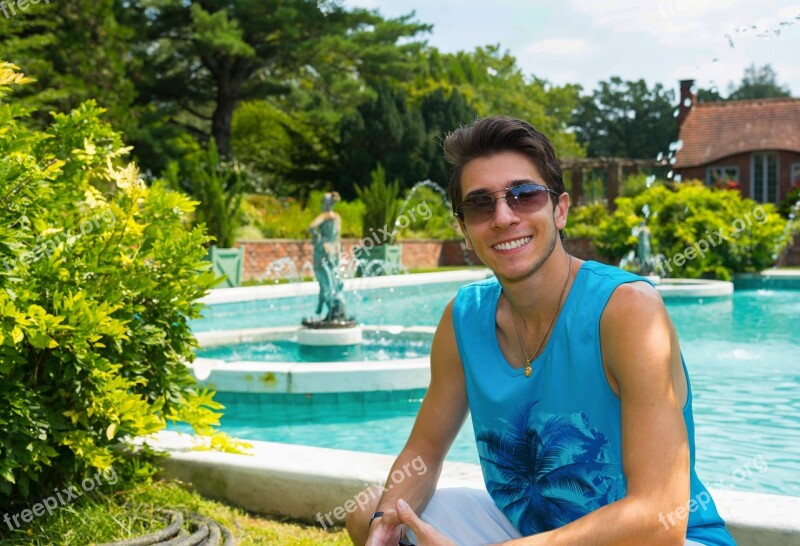 Young Man Sunglasses Smile Estate Fountain