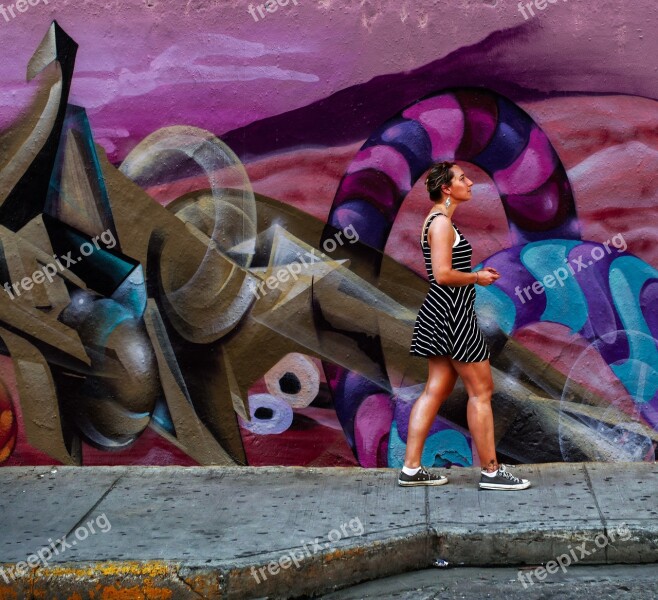 Woman Walking Grafitti Wall Pavement