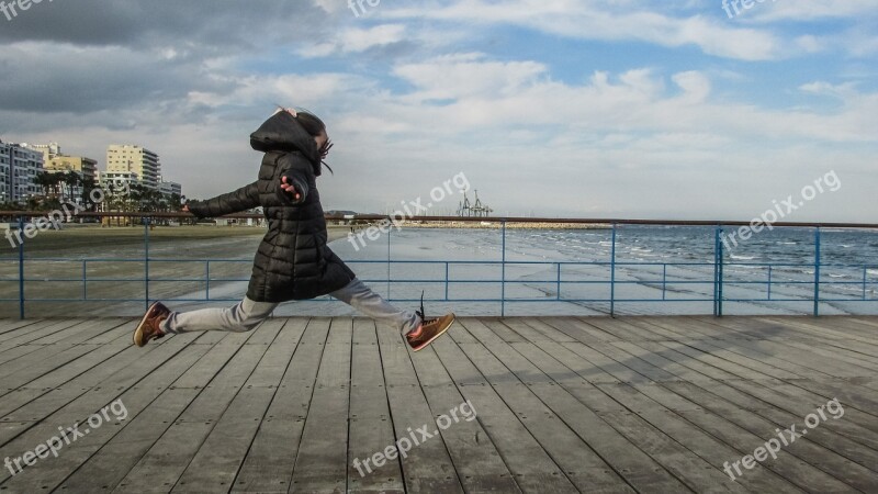 Girl Playing Jump Happy Kid Jumping For Joy