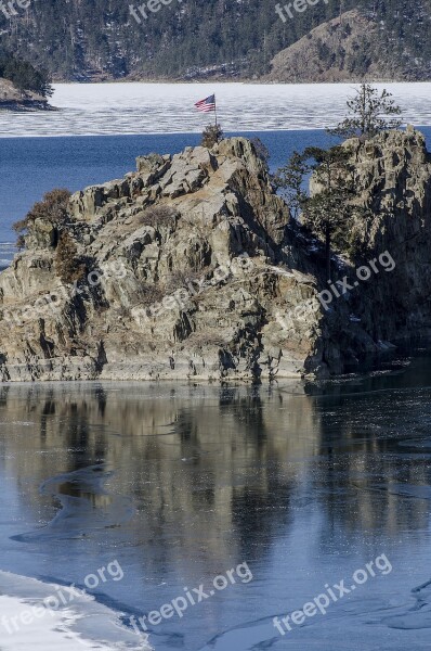 Lake Rocks Frozen American Flag Ice