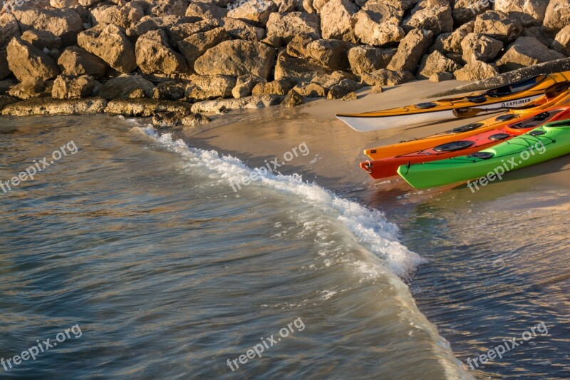 Kayaks Beach Shore Stone Wall