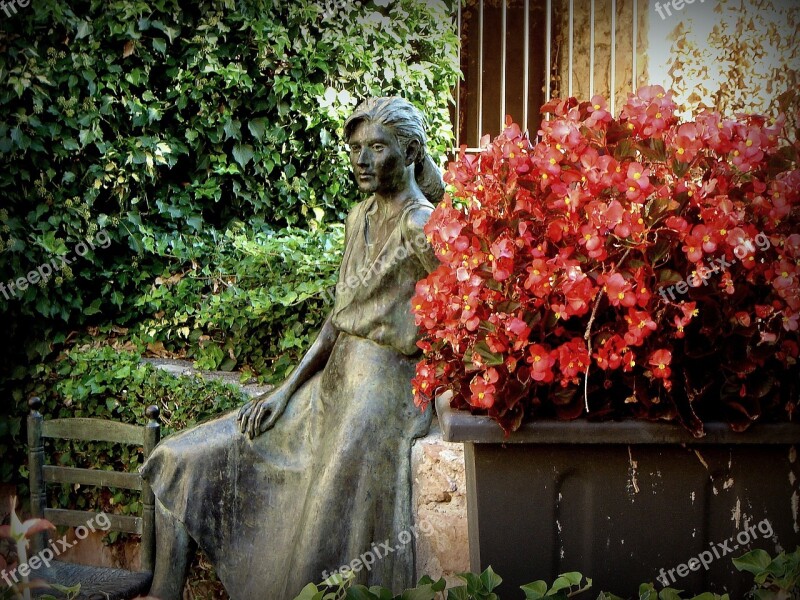 Statue Geraniums Garden Red Plants