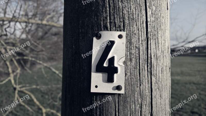 Shield Four Telephone Poles Number At