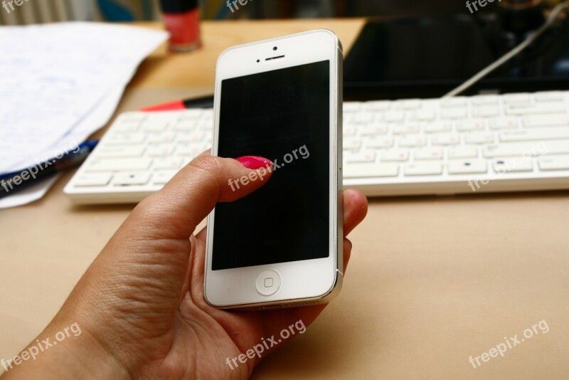 Cellphone Iphone Hand With Telephone Phone At Work