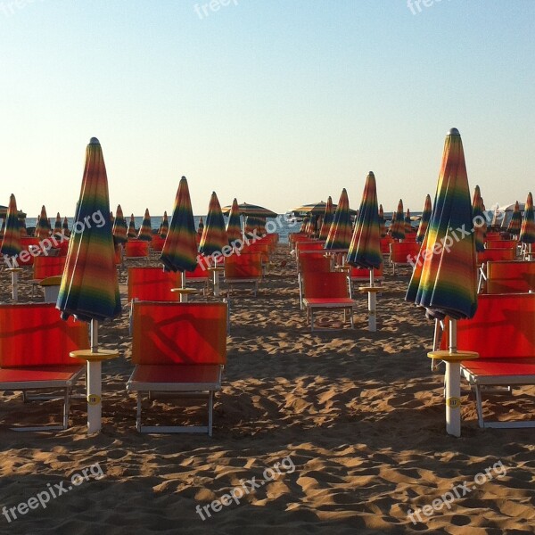 Sea Umbrellas Orange Sand Beach