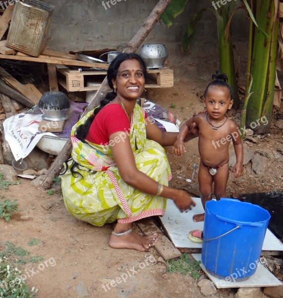 India Mother Baby Bathing Child