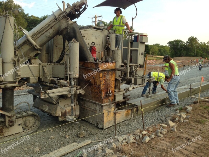 Heavy Equipment Working Curb And Gutter Laying Curb And Gutter Construction Construction Workers