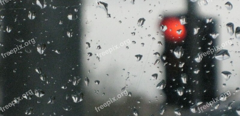 City Red Driver Window Raindrops