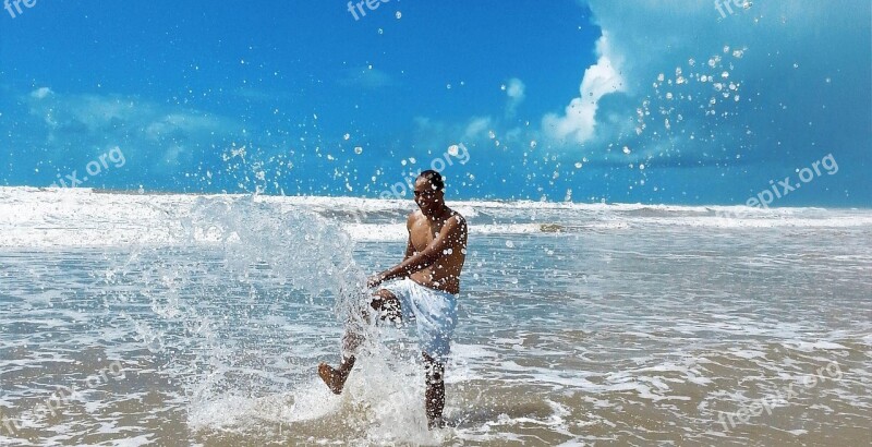 Beach Mar Joy Man Kicking Water Free Photos