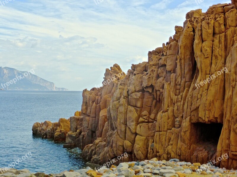 Rocky Red Seaside Sandstone Cliff