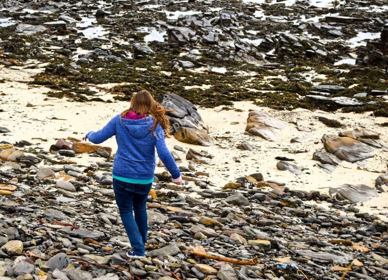 Beachcomber Girl Beach Sand Rocks