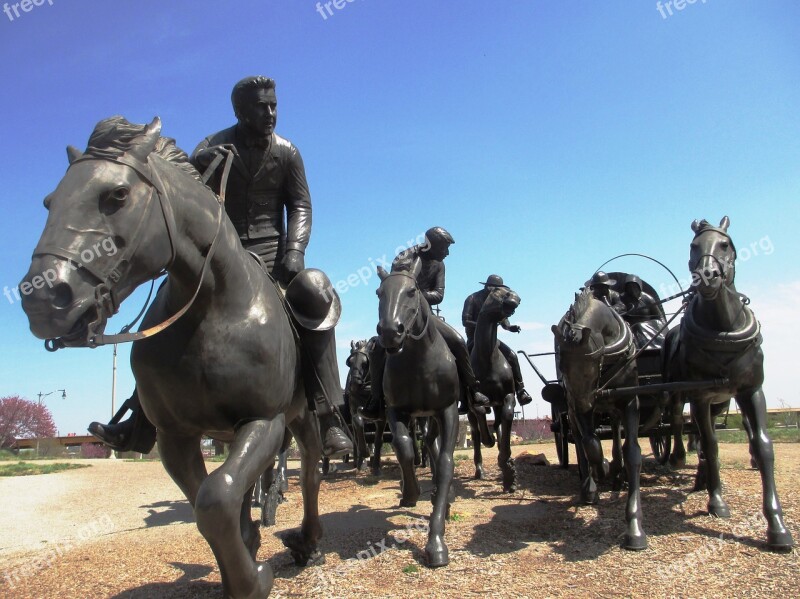 Oklahoma Sooners Display River Walk Park In Ok Horses Riders Land Rush