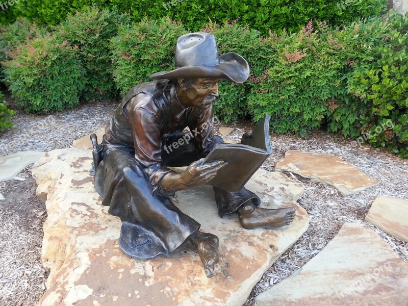 Statue Cowboy Reading Library Free Photos