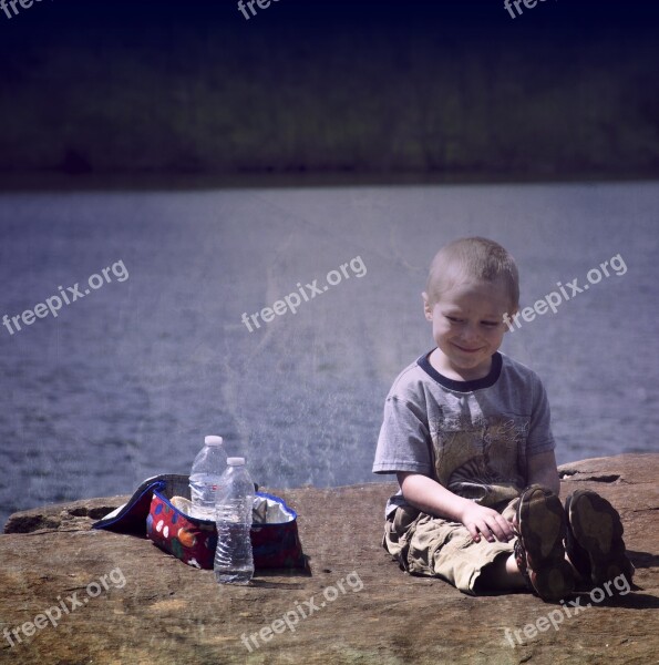 Boy Happy Picnic Outside Lake