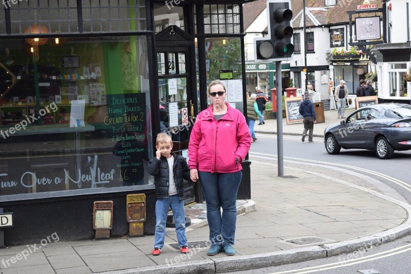 Peoples Mother And Son Street Car On The Road