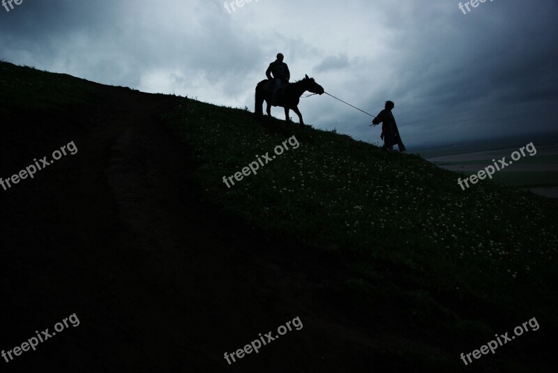 Dark Clouds Horseback Riding Hillside Twilight Ruoergai