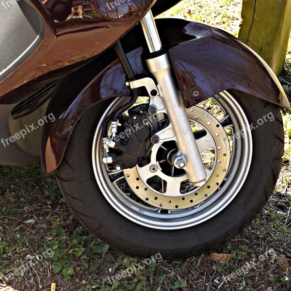 Mature Motor Scooter Brake Rim Free Photos