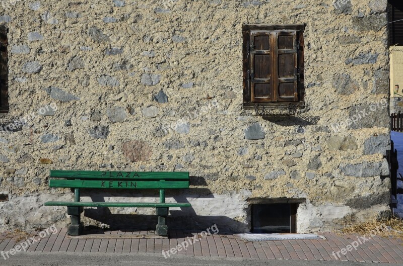 Green Bench In Front Of The House Wall Of Stone Free Photos