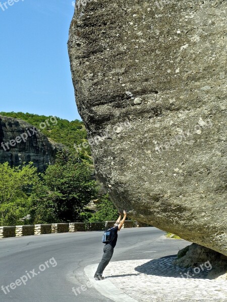 Rock Holding Mighty Effort Power