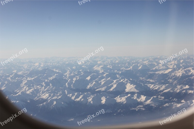 Aerial Window Mountains Peaks Snow