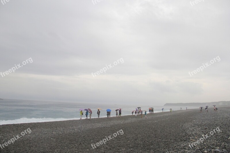 Beach Cloudy Day The Wind Blows Several People Along The Coast Mysterious And Beautiful