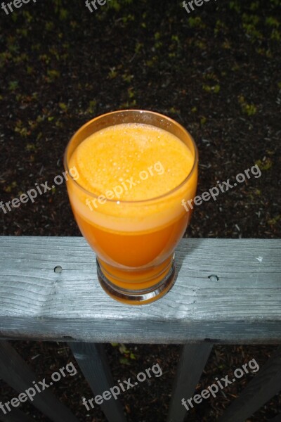 Carrot Juice Glass Cup Outside Deck