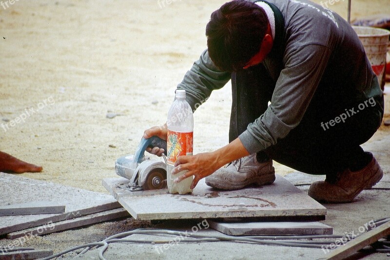 Workers Angle Grinder Saw Tiles Plate