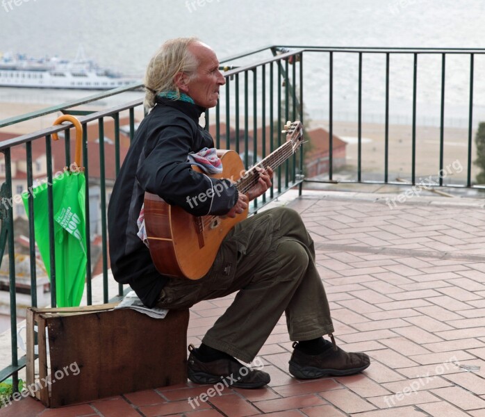 Street Musician Guitar Player Sit Listen To Music