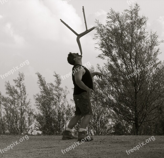 Balancing Man Chair Chin Performance