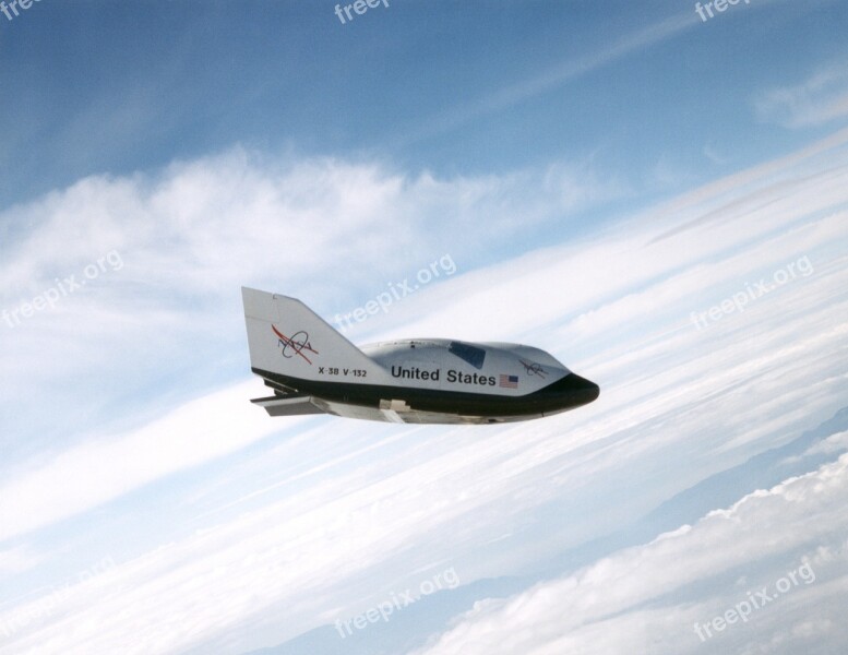 X-38 Space Vehicle Flight Clouds Crew Return