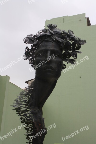 Woman Metal Statue Face Swirl