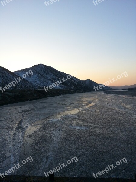 Glow Sunset Frozen River In The Cold Winter