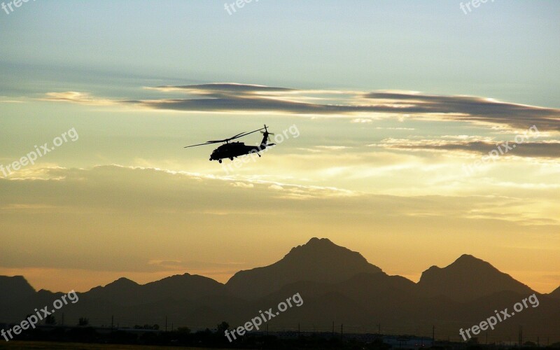 Military Helicopter Flying Dusk Mountains Desert