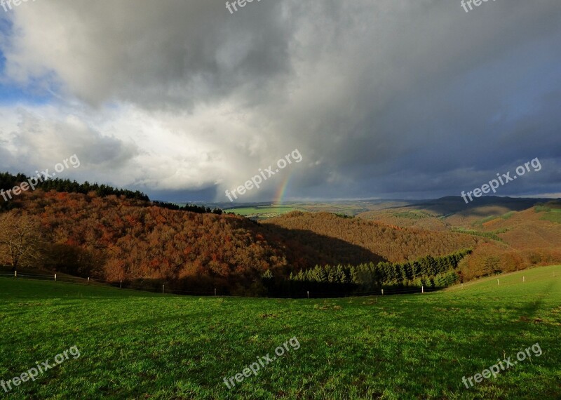 Rainbow Storm Threatening Sky Hills Landscape