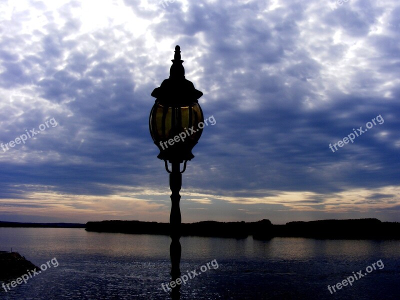 Lantern In The Evening Water Landscape Sunset