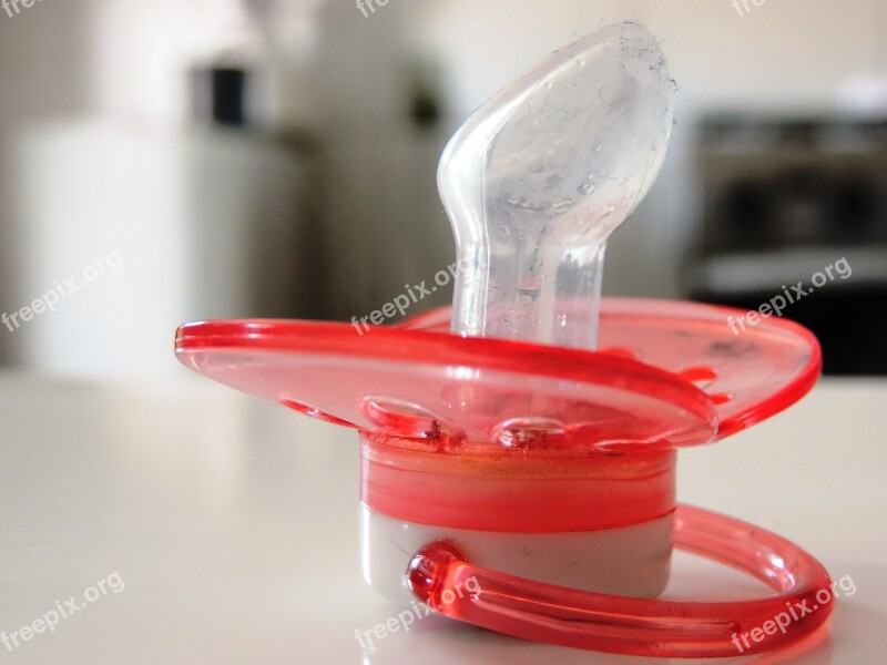 Pacifier Red Table A Children's Toy Free Photos