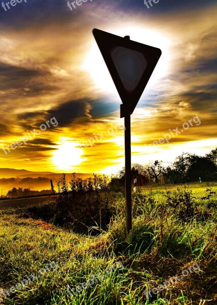 Street Sign Attention Right Of Way Backlighting Sunset