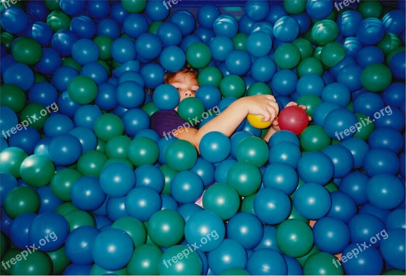 Child Playing Balls Hiding Fun